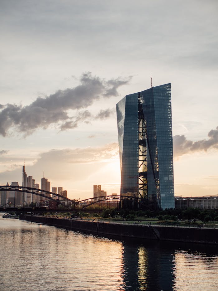 Stunning view of Frankfurt's skyline featuring ECB building at sunset.